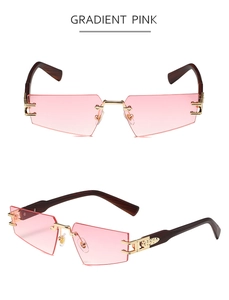 Détail de lunettes de soleil polygonales sans monture avec verres dégradés roses et bois
