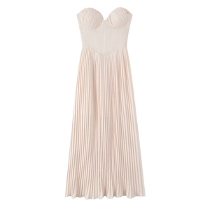 Detail view of pink pleated long dress featuring a structured strapless bodice and cups