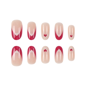 Press-on nail set featuring red heart patterns and French tip design in red and white