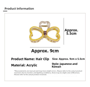 Detailed view of yellow acrylic hair claw clip with purple rhinestone and 9cm size dimensions