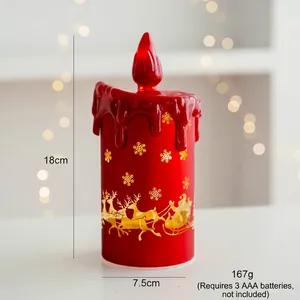 Detail of red Christmas glass LED candle light featuring golden reindeer and snowflakes