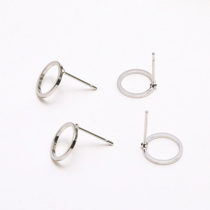 Detail of four silver 925 sterling silver C-shape hoop earrings with diy posts