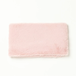 Detailed texture of a soft pink faux rabbit fur neck warmer scarf on white background