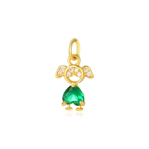 Macro view of gold pendant with heart-shaped green gemstone and micro-paved diamonds