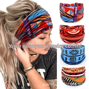 Detail showing elastic headbands with various African geometric and boho print patterns