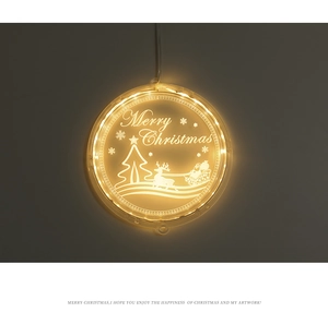Detailed laser-engraved acrylic LED light showing Merry Christmas deer and tree motifs