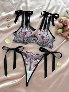 Detailed butterfly embroidery on sheer mesh bra set with large satin ribbons