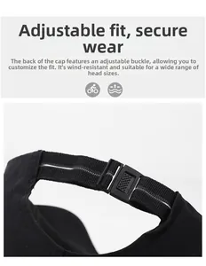 Detail of adjustable plastic buckle and elastic strap on a black sports baseball cap