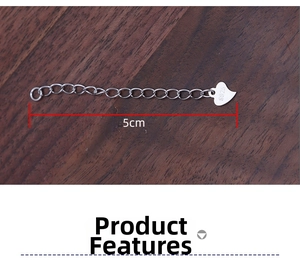Detail of 5cm S925 sterling silver extender chain with a heart pendant and hallmark