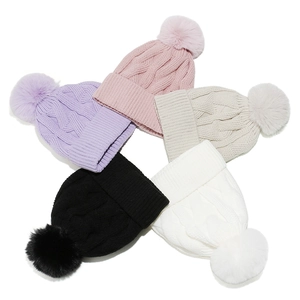 Fleece lined winter knit beanies with cable patterns and faux fur pom poms in five colors