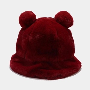 Close-up of a warm burgundy faux fur bucket hat featuring cute double bear ears design