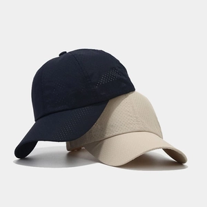 Breathable quick-dry baseball caps with laser-cut holes in navy and beige colors