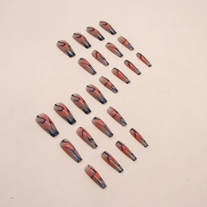 Long ballerina press-on nails with orange gradient and dark blue flame design