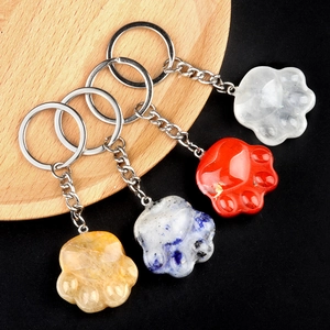 Cat paw keychains in four natural agate stone colors with silver metal rings and chains