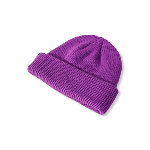 Detailed close-up showing the vertical ribbed knit pattern on a dark purple beanie hat