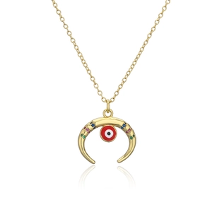 Detail of 18K gold crescent necklace with multicolored zircon and evil eye charm