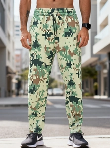 Detail of men's cargo pants with digital camo print and elastic waistband with drawstring