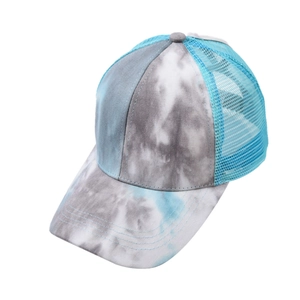 Detail of tie-dye ponytail baseball cap featuring breathable light blue mesh and curved brim
