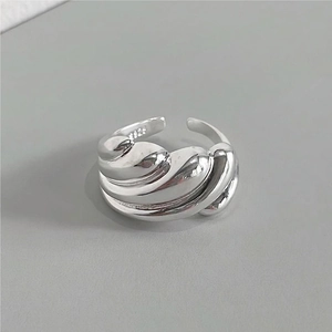 Polished S925 sterling silver open ring with unique wavy croissant textured design