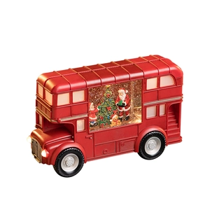 Christmas red double-decker bus decoration with Santa and sparkling snowflake lights