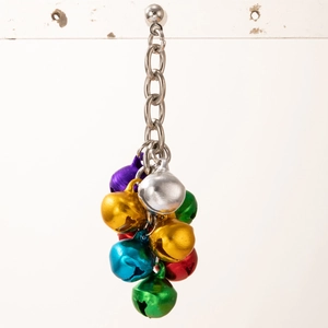 Close-up of colorful metal bells on Christmas earrings with vibrant metallic finishes