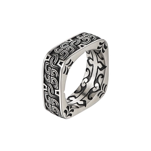 Vintage silver square signet ring for men featuring Celtic knots and scroll relief patterns