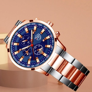 Detail of rose gold and silver chronograph watch with blue dial and date display