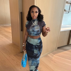 Women's two-piece abstract print set with cropped top and high-waisted bodycon maxi skirt