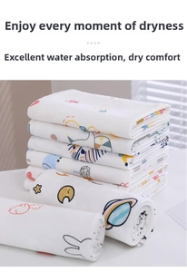 Detail showing soft cotton gauze baby swaddle towels with colorful cartoon prints