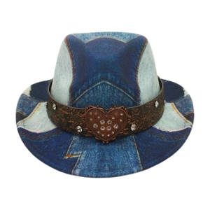 Close-up of heart-shaped rhinestone buckle on blue denim print western cowboy hat