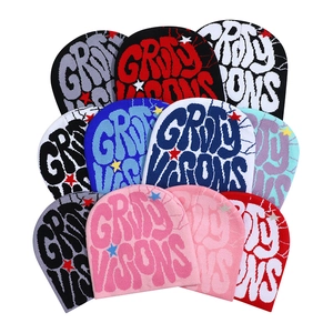 Street style knit beanies with Groovy Visions lettering and star patterns in multi-color