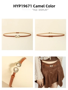 Detail of camel slim belt with decorative golden fan-shaped pearl buckle for dresses