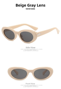 Detail of cream oval sunglasses with grey lenses and chic metal hinge accents