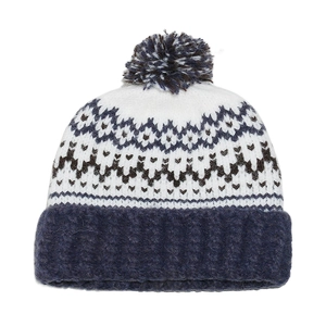 Detailed knit texture of Fair Isle beanie with a mixed color pom-pom and ribbed cuff