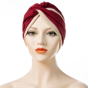 Two-tone burgundy and beige twisted turban hat for women in soft elastic knit fabric