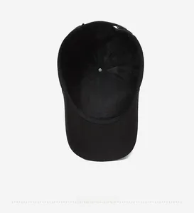 Interior view of black baseball cap showing cotton twill fabric and mesh structure
