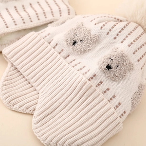 Winter knit baby hat with bear patches, fleece lining and cream pom-pom for boys