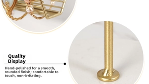 Macro shot of polished gold metal jewelry stand with hand-polished beads and base