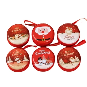 Set of 6 festive Christmas tin coin purses with Santa Claus and reindeer illustrations