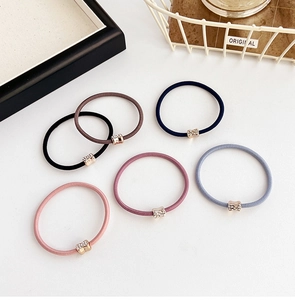 Set of six colorful elastic hair ties with sparkling rhinestone metal buckles