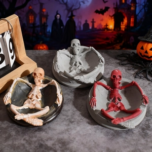 Halloween skull ashtray resin molds in three color variations with detailed spooky design