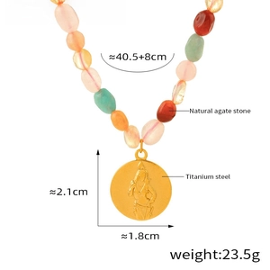 Bohemian natural stone beaded necklace with titanium steel wonder woman coin pendant detail.