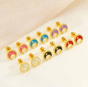 Detail of colorful enamel star and moon stud earrings in 18k gold plated stainless steel