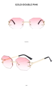 Detail of rimless octagonal sunglasses with pink gradient lenses and eagle claw metal hinge