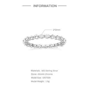 Detailed view of sterling silver eternity ring featuring claw-set AAAAA zirconia stones