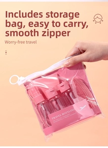 Pink travel toiletry set with spray bottles and comb in a clear zippered storage pouch