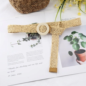 Bohemian braided waist belt with round buckle shown on a lifestyle magazine background
