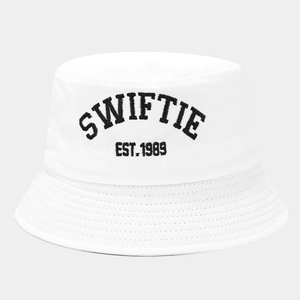 Detail of Swiftie Est. 1989 black embroidery on a white cotton bucket hat for fans