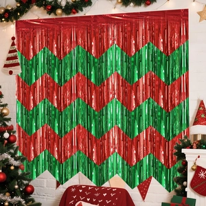 Detail of red and green wavy foil fringe curtains in a festive Christmas party setting