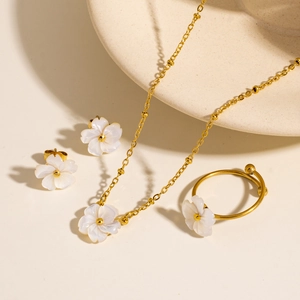 Elegant 18K gold-plated titanium shell flower necklace, earring, and ring set